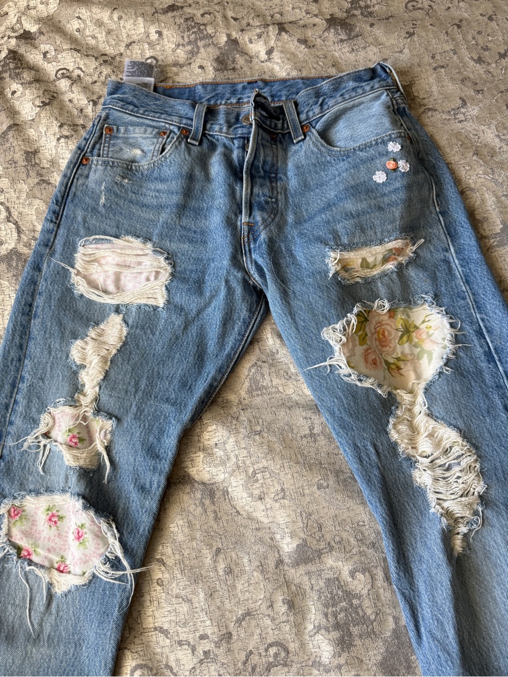 Levi's Light Blue Distressed Boyfriend Jeans with Floral Patches